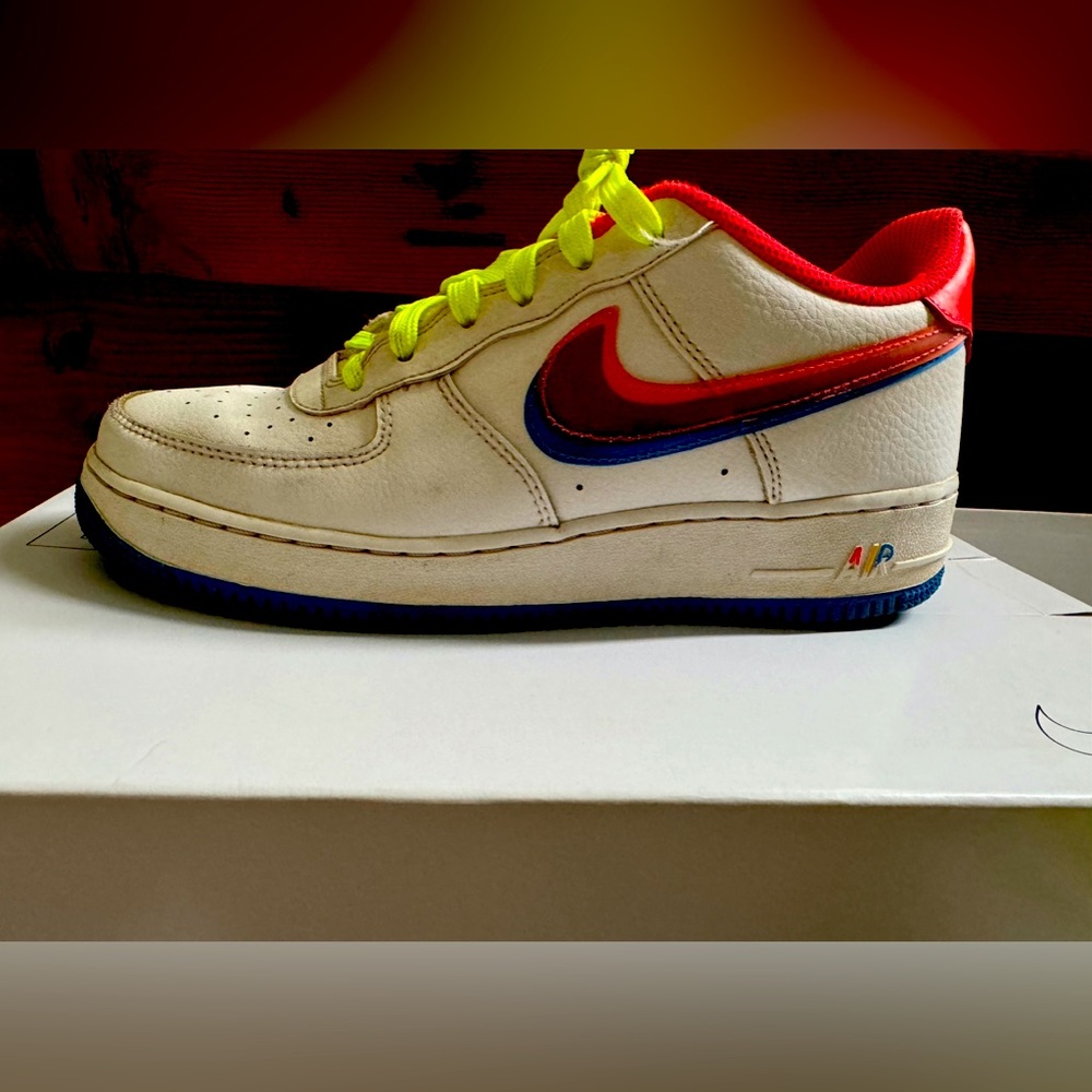 Nike air force 1 , white and neon orange and blue , size 7 mens youth .